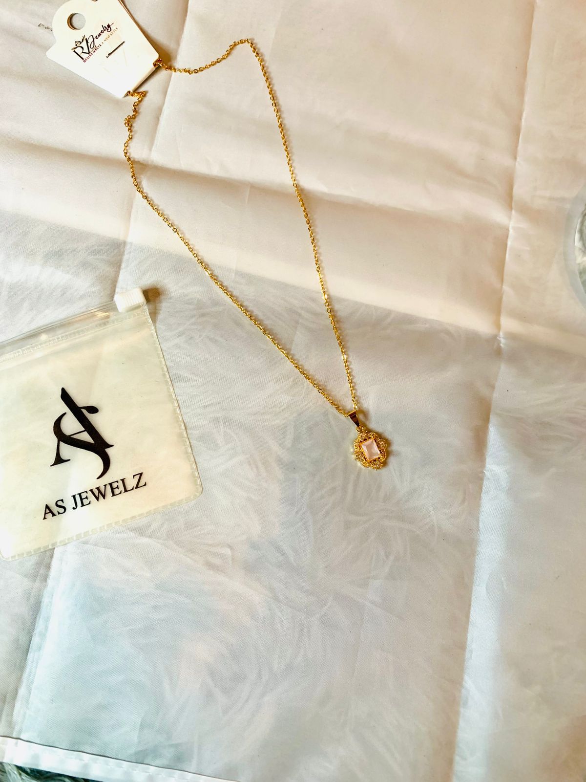 Pendent Set Square shape with soft pink stone